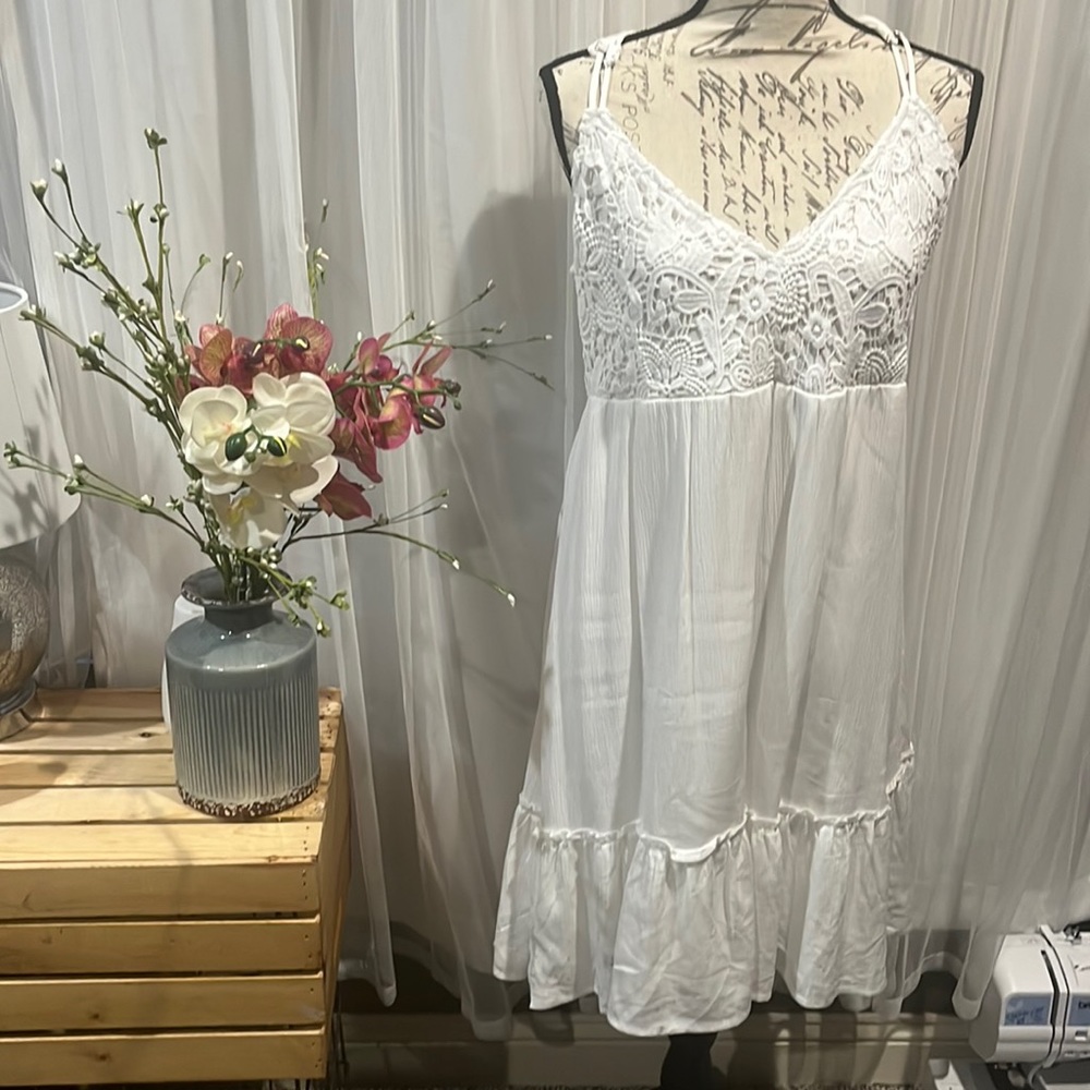 It is from Maurices in a size small, color white.
